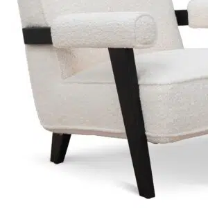 Naomi armchair in ivory white sherpa with timber wood frame and asymmetrical legs for modern spaces