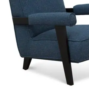 Damon armchair in dark blue fabric with birch legs and plush comfort