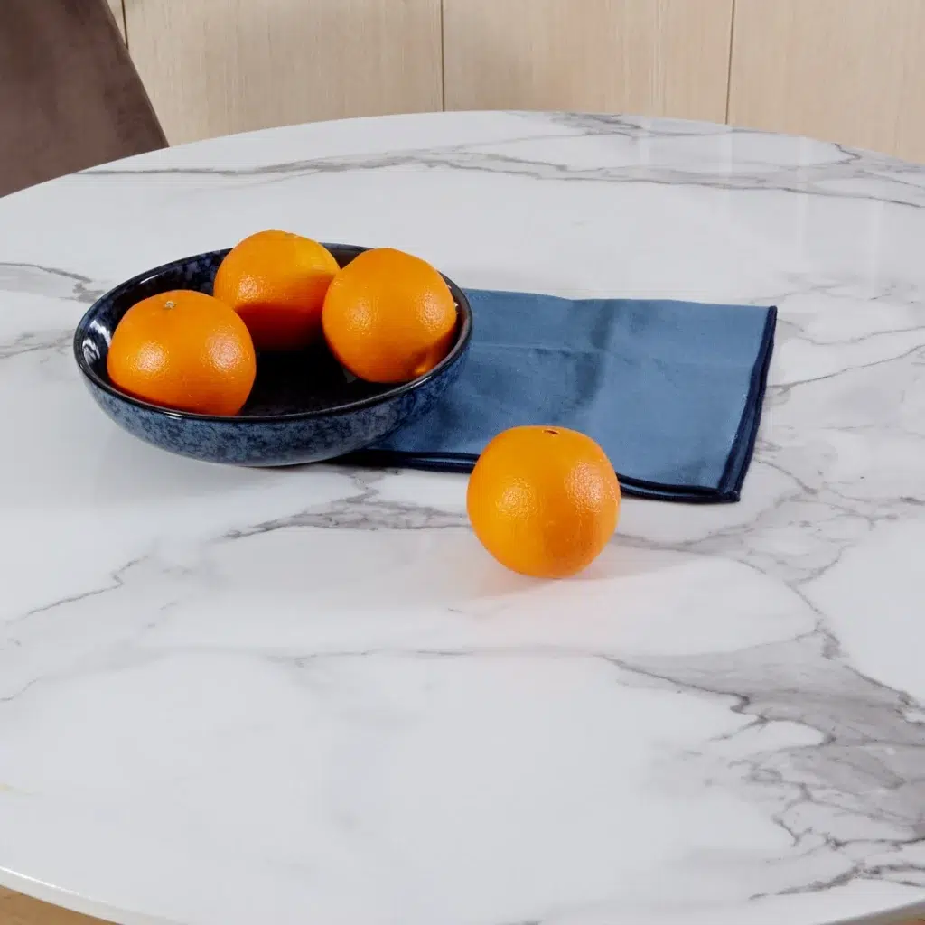 White marble effect round dining table with tulip base for 6 people, modern minimalist design