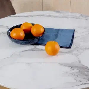 White marble effect round dining table with tulip base for 6 people, modern minimalist design