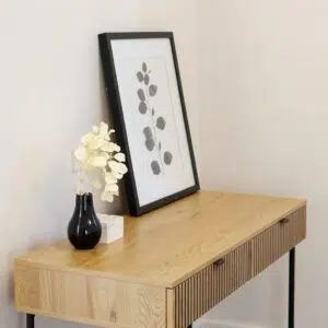 Linjer entertainment unit with oak melamine finish black metal legs and ample storage