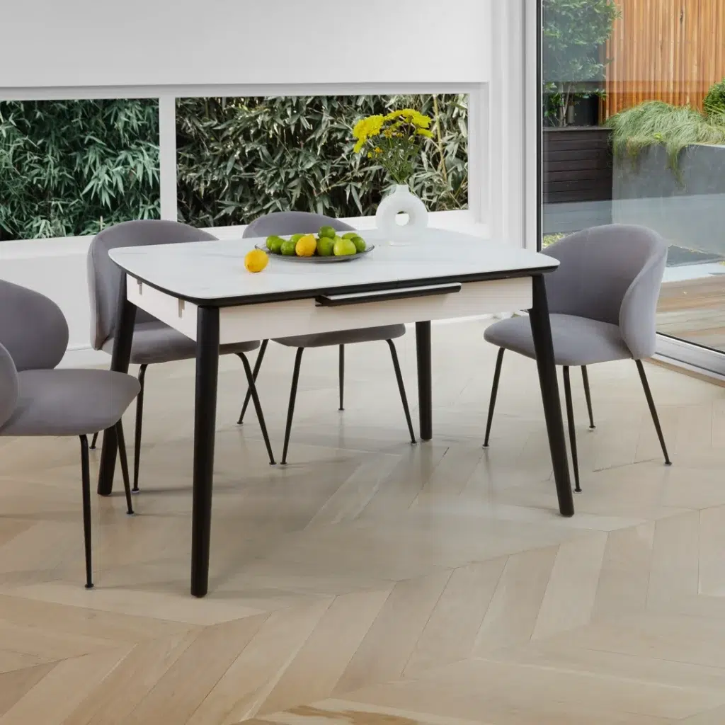 Mila Snow White Ceramic Extendable Dining Table with Marble Effect and Black Rubberwood Frame