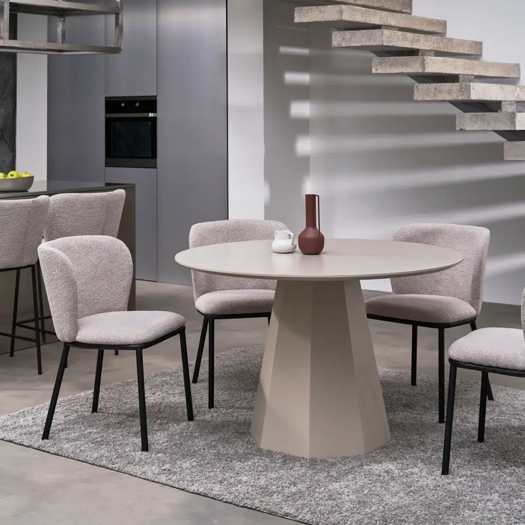 Modern latte boucle dining chairs with black metal frame and textured upholstery for stylish interiors