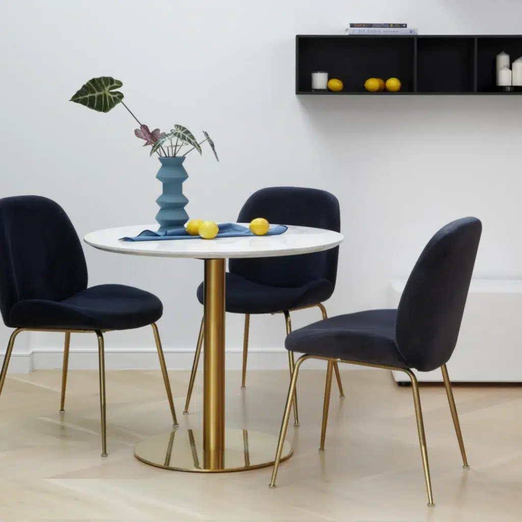 Asta dining chairs in ink velvet with golden legs for modern elegance and comfort
