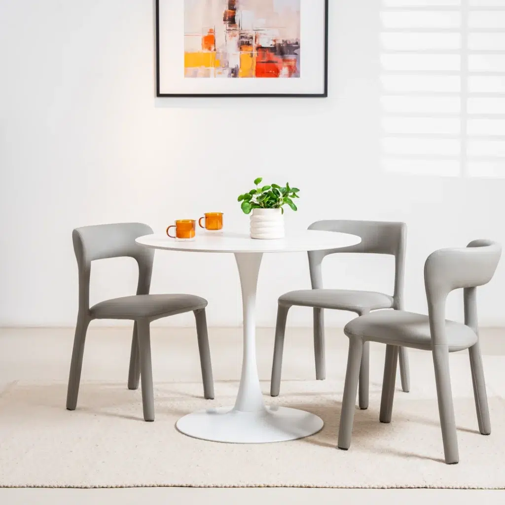 Scandi dining table with matte ceramic top and metal base