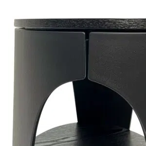 Nova round side table in full black with ash wood texture and three-leg support for modern interiors
