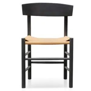 Black rattan dining chair with geometric base and natural woven seat