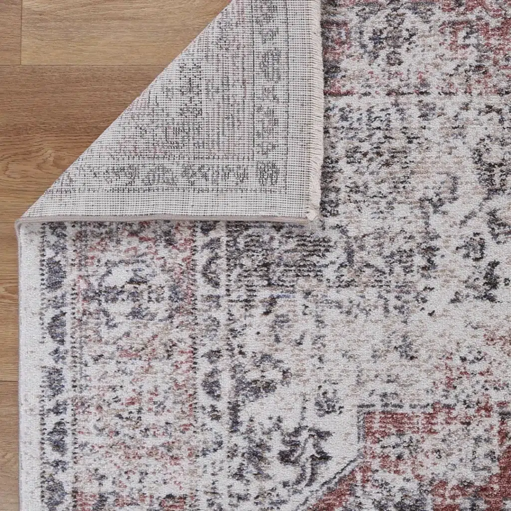 Provence-inspired abstract rug with cream and light grey tones, anti-static polypropylene fibers for durability.