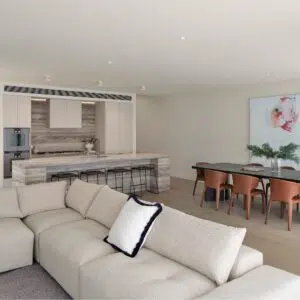 Black wooden bar stool with 65cm seat height, sleek minimalist design and natural wood grain.