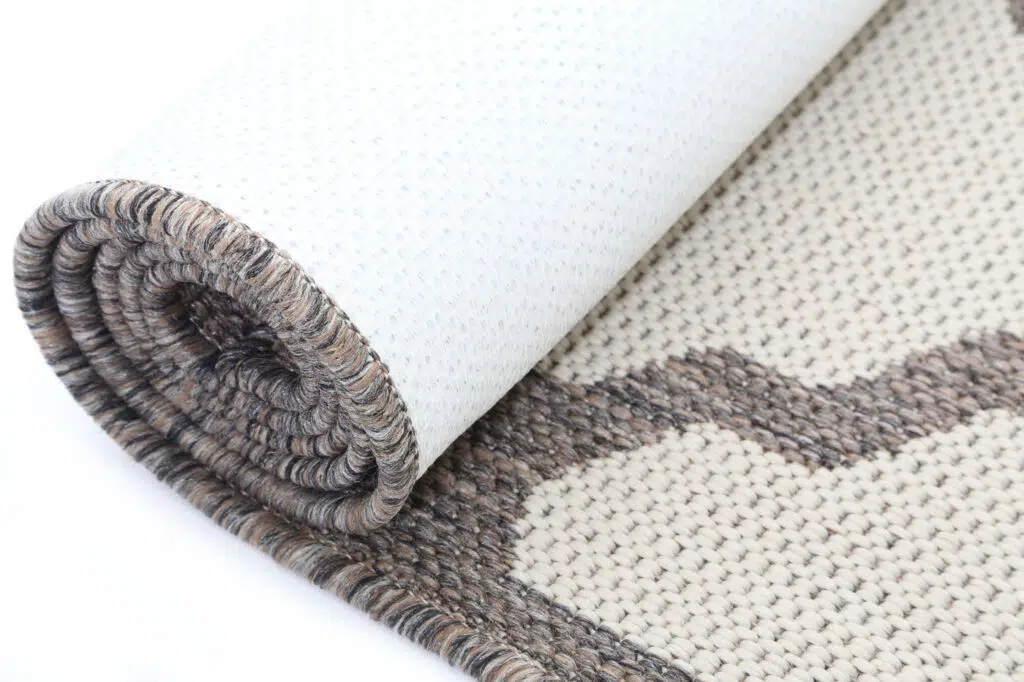 low-maintenance geometric rug with neutral design and durable heatset polypropylene construction