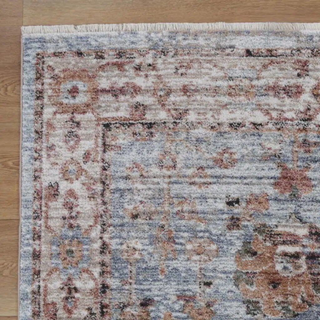 Modern transitional blue rug with durable design and versatile size.