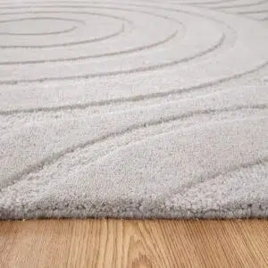 Les Nomades Ellipse Light Grey Wool Rug - Earthy Sophistication Meets Modern Design with Soft Looped Texture and Neutral Tones