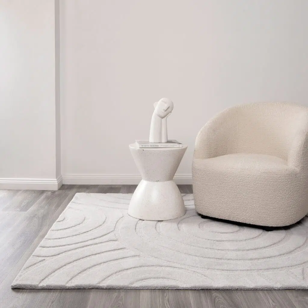 Les Nomades Ellipse Light Grey Wool Rug - Earthy Sophistication Meets Modern Design with Soft, Looped Texture and Neutral Tones for Versatile Use in Living Rooms, Bedrooms, or Entryways.