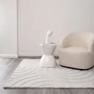 Les Nomades Ellipse Light Grey Wool Rug - Earthy Sophistication Meets Modern Design with Soft, Looped Texture and Neutral Tones for Versatile Use in Living Rooms, Bedrooms, or Entryways.