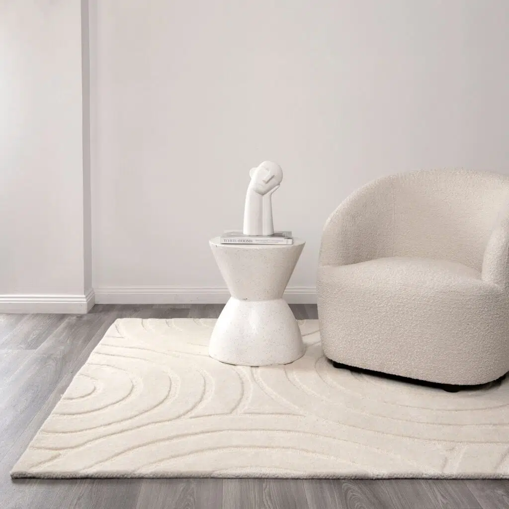 Hand-tufted cream wool rug with organic patterns