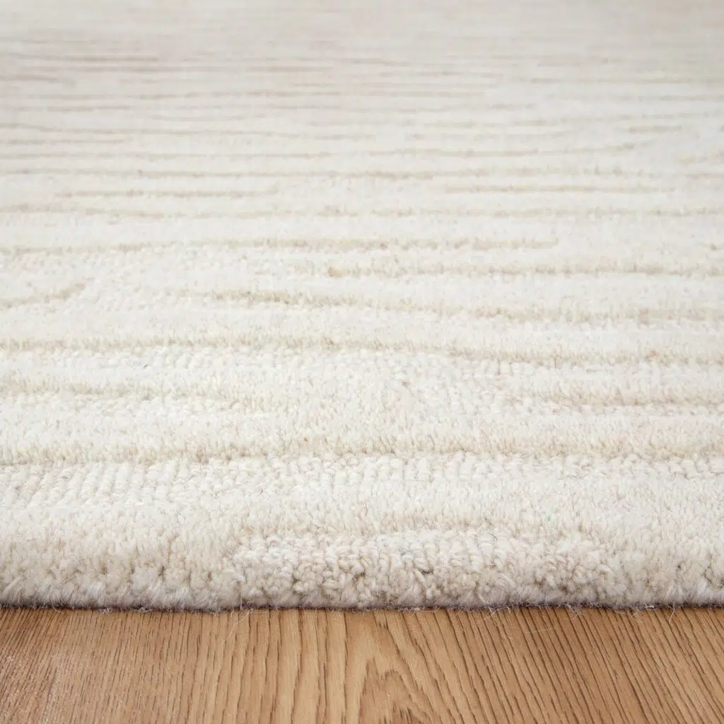 Earthy organic wool rug with modern design and natural texture