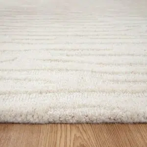 Earthy organic wool rug with modern design and natural texture