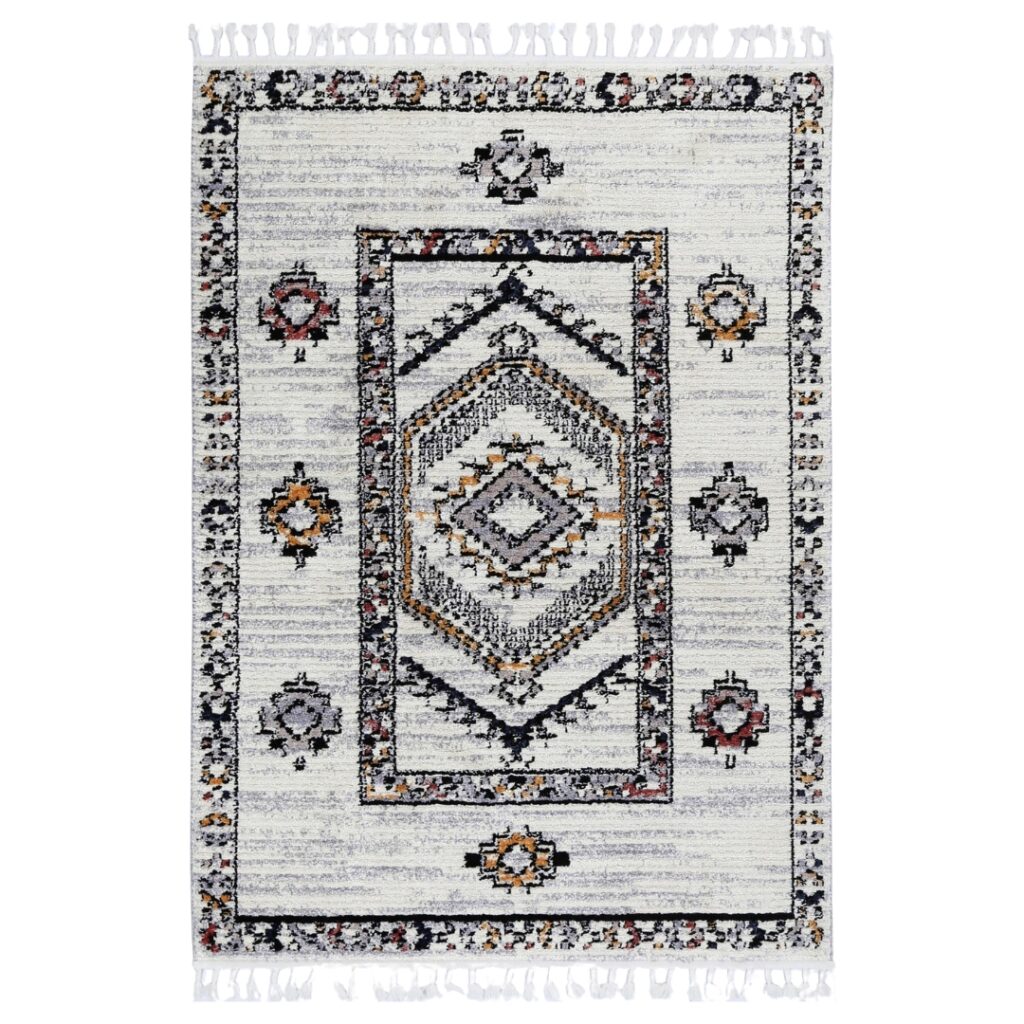 Ultra-soft polyester shag rug with Moroccan-inspired tribal border – durable, versatile, and elegant.
