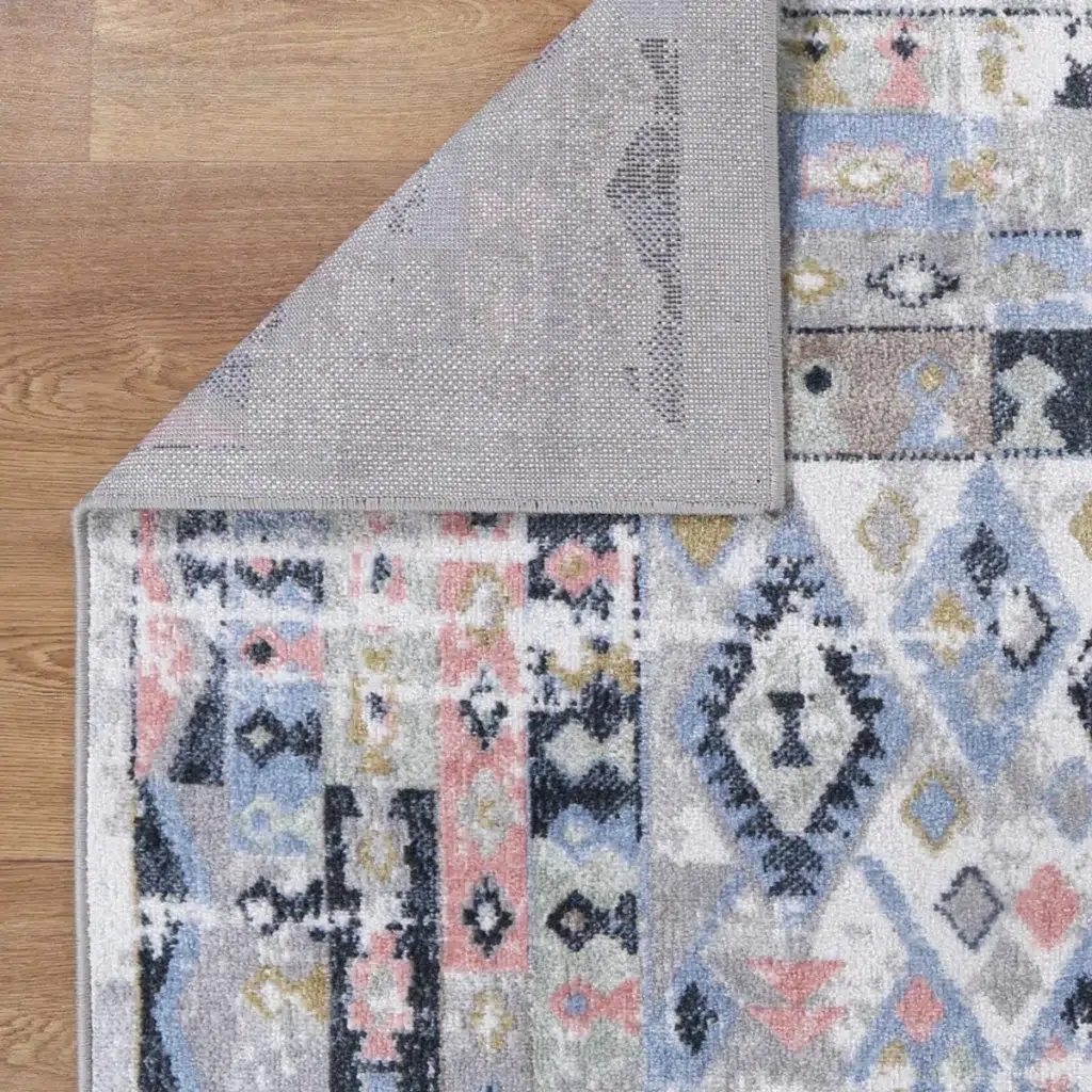 Oporto Colombo Multi Tribal Soft Rug featuring transitional distressed designs and contemporary abstract patterns in neutral tones adding depth and character to any room
