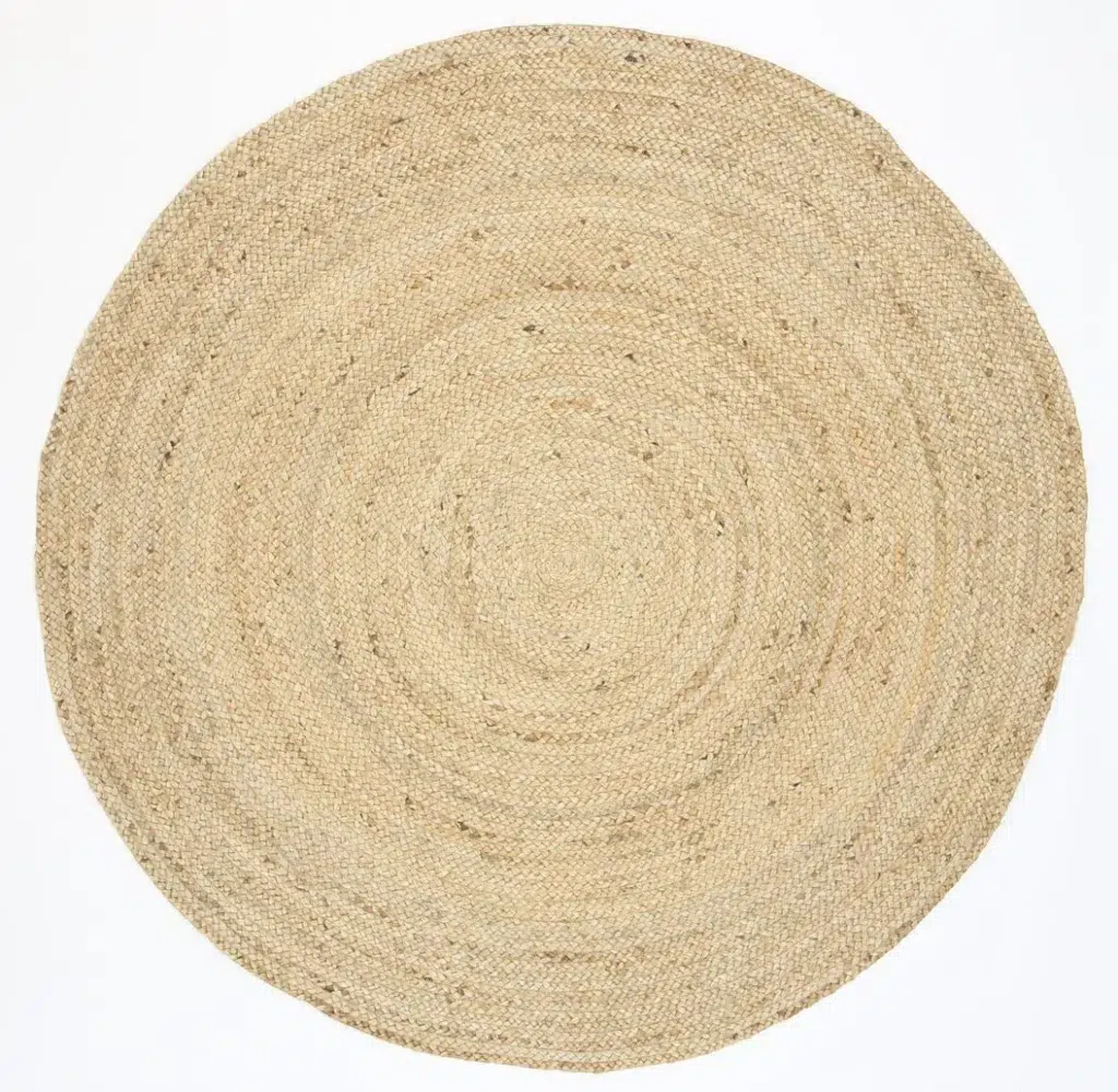 Natural jute round rug handwoven by artisans perfect for high traffic areas adds rustic charm to any home decor