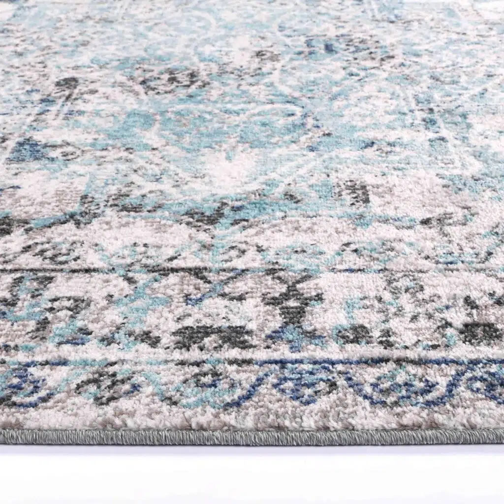 Ivory and blue transitional rug perfect for living rooms bedrooms or workspaces soft 11mm pile easy maintenance