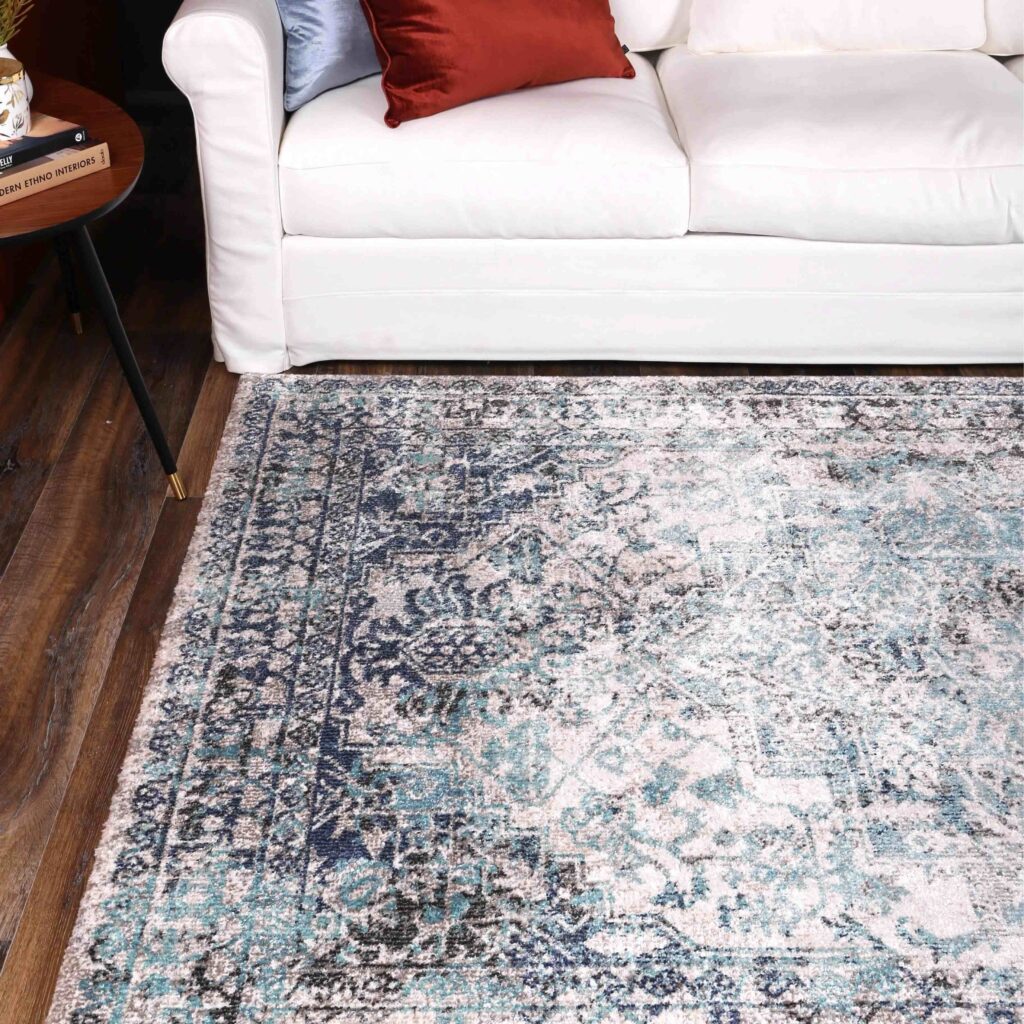 Ivory and blue transitional rug perfect for any space with soft 11mm pile height easy maintenance and available in various sizes and shapes