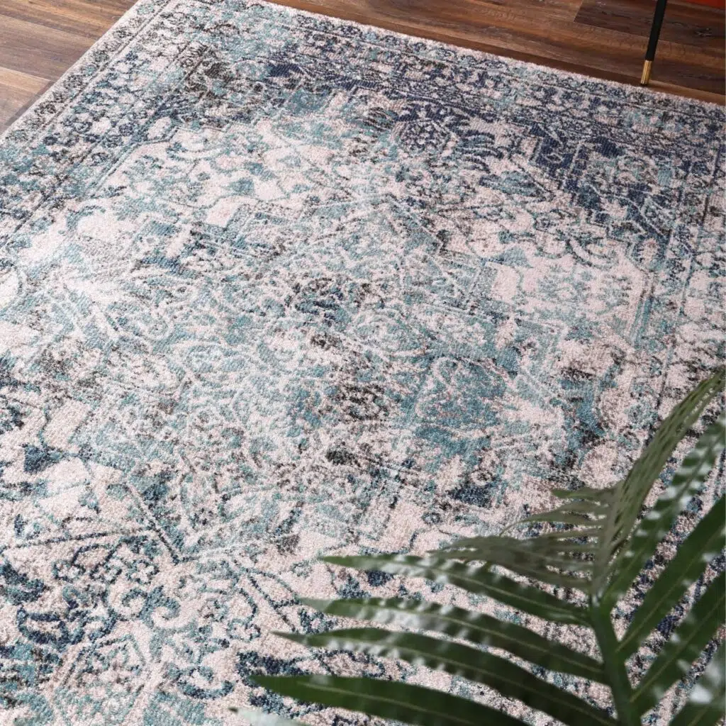 Ivory and blue transitional rug perfect for any space with comfortable 11mm pile height easy maintenance and multiple size options