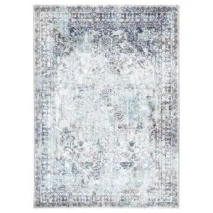 Versatile transitional rug in ivory & blue, made of polypropylene for comfort and durability.