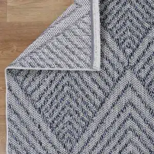 Vanuatu Naka charcoal geometric flatweave rug for indoor outdoor use