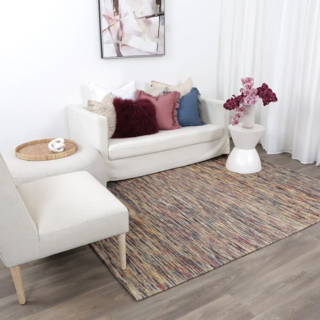 Copacabana geometric multi wool rug hand loomed in India featuring natural tones and durable flatwoven loop construction for any room