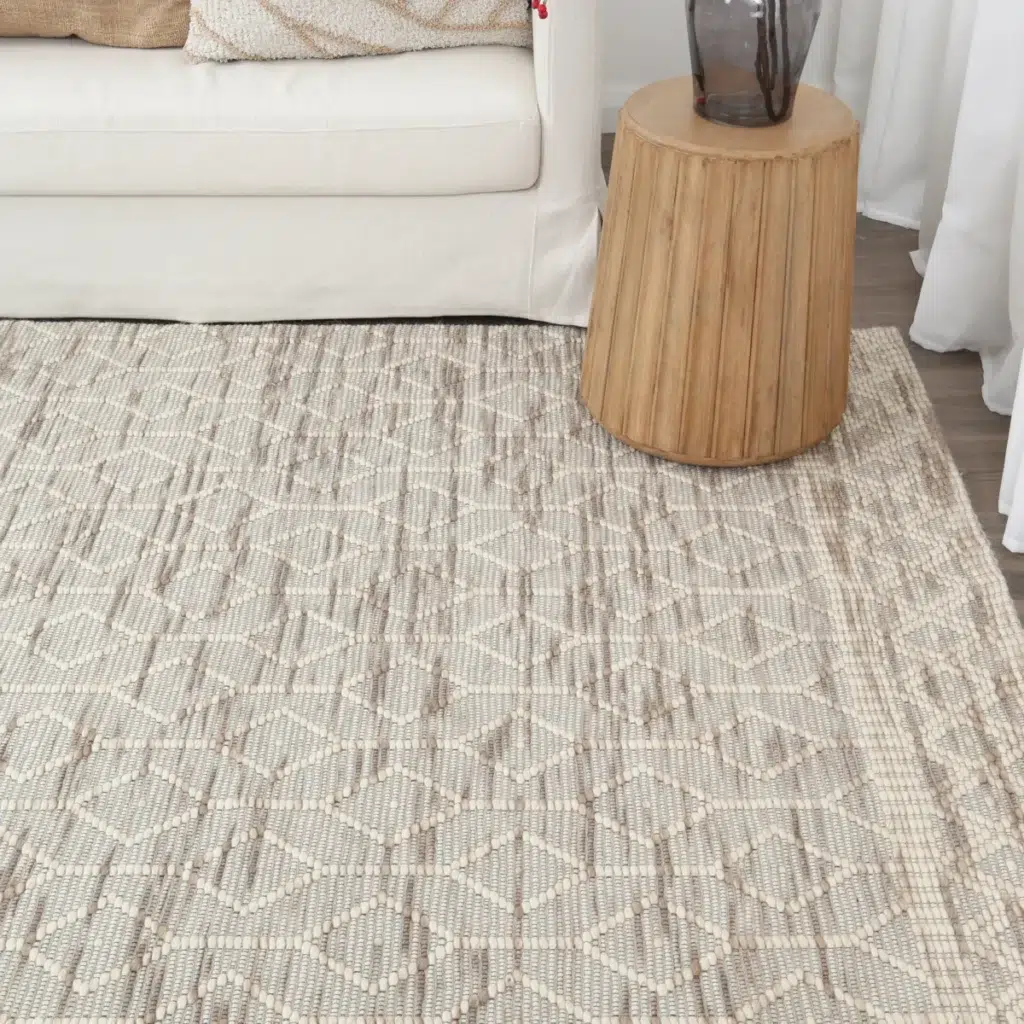Handloomed Copacabana Beige Wool Rug with Loop Pile Texture Enhances Any Room Decor