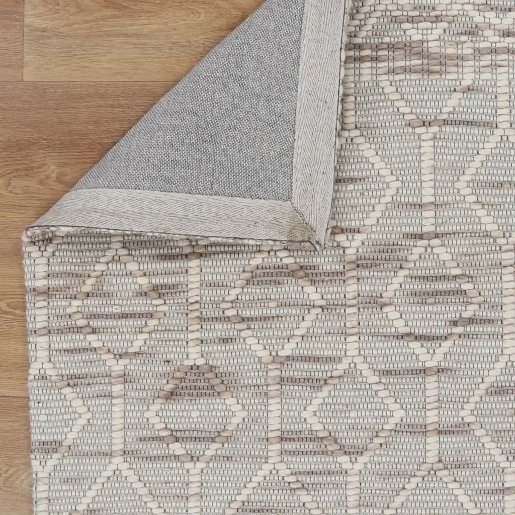 Copacabana lattice beige wool rug handcrafted in India adds elegance to any room soft durable perfect for modern bohemian spaces