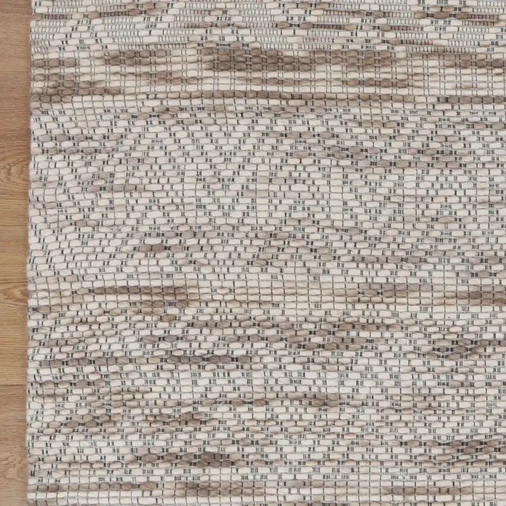 Copacabana Chevron Beige Wool Rug hand loomed soft felted wool polyester blend adds warmth elegance to any room