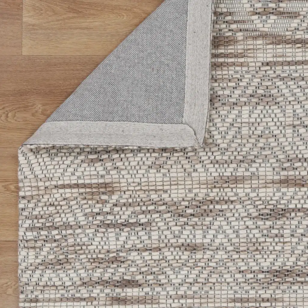 Copacabana Chevron Beige Wool Rug hand loomed soft felted wool polyester blend inviting natural tones craftsmanship artistry flatwoven texture