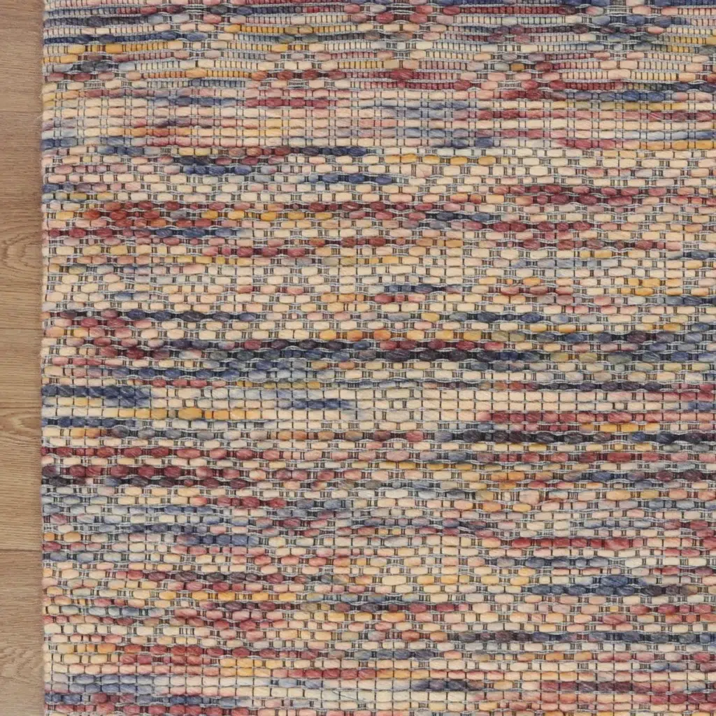 Copacabana Chevron Multi Wool Rug handcrafted in India featuring neutral tones and soft felted wool blend perfect for any room adding warmth and sophistication