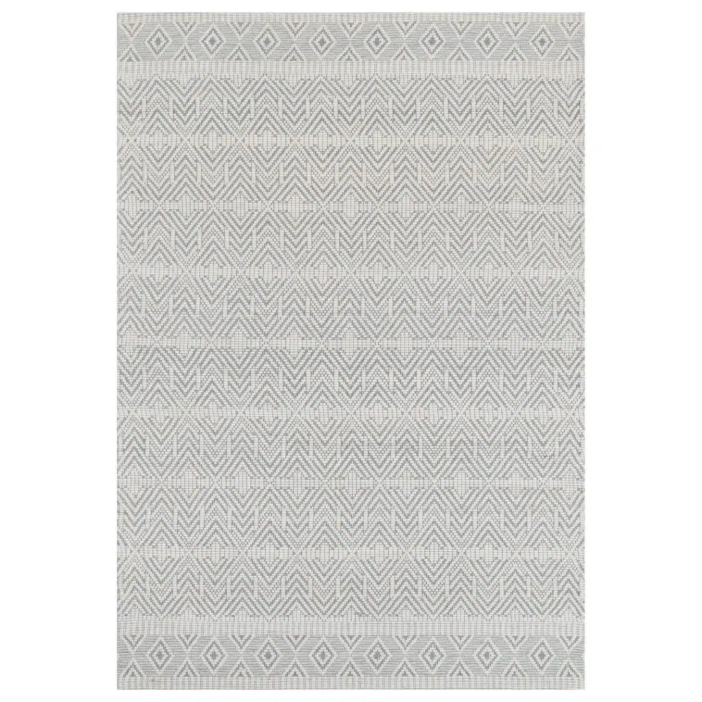 Copacabana Chevron Light Grey Wool Rug hand loomed in India perfect for modern bohemian spaces soft felted wool polyester blend durable luxurious feel underfoot
