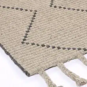 Hand tufted wool blend ash rug adds warmth and elegance to any room with its zig-zag pattern and plush texture ideal for living spaces
