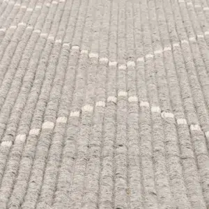 Handcrafted Goa Zig-Zag Wool Blend Grey Rug adds warmth and texture to any room with its luxurious feel and modern design perfect for high traffic areas or bedrooms