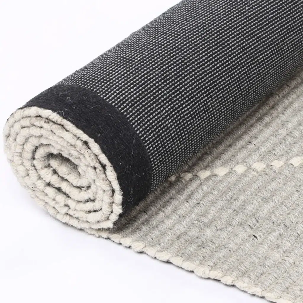 Handcrafted zig-zag wool blend grey rug adds warmth and texture to any room soft durable construction perfect for high traffic areas