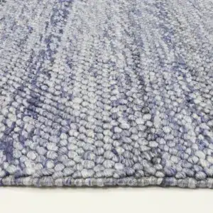 Harlow Loopy Blue Wool Blend Rug soft cozy underfoot elegant simplicity neutral colors hand loomed craftsmanship durable high quality pile texture modern traditional interiors