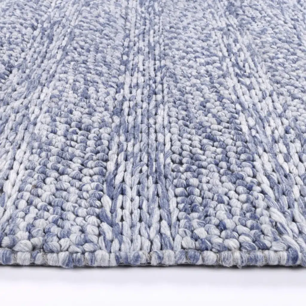 Harlow Ringlets blue wool blend rug adds elegant simplicity and cozy texture to any room