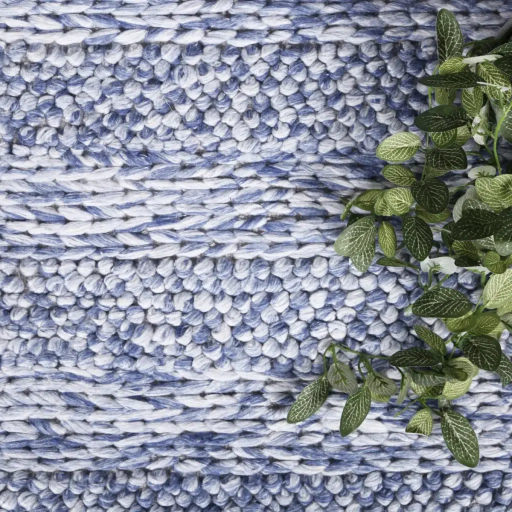 Harlow Ringlets blue wool blend rug adds elegant simplicity and cozy texture to any room neutral tones hand loomed craftsmanship durable high quality pile soft underfoot perfect for living room bedroom or dining area