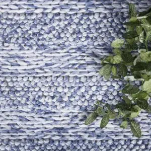 Harlow Ringlets blue wool blend rug adds elegant simplicity and cozy texture to any room neutral tones hand loomed craftsmanship durable high quality pile soft underfoot perfect for living room bedroom or dining area