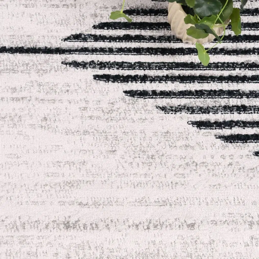 Kimberley Diamond Charcoal Contemporary Rug adds sophistication and comfort to any room with modern design and easy-to-clean material