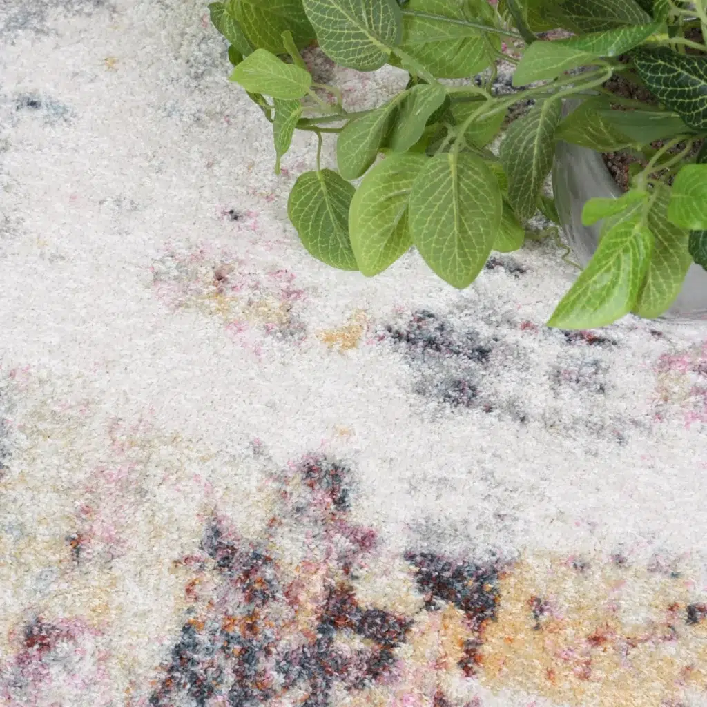 Soft Santa Fe Verada Abstract Multi Rug adds comfort and color to any room with durable heat-set polypropylene fibers perfect for living rooms and bedrooms