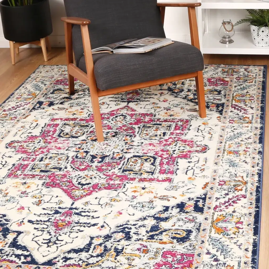 Sicily Nicosia Navy Pink Transitional Rug adds vibrant elegance to any room with durable easy-care fibers