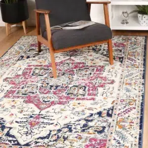 Sicily Nicosia Navy Pink Transitional Rug adds vibrant elegance to any room with durable easy-care fibers