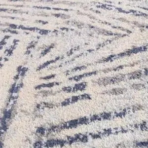 Luxurious Sicily Ferraro Ivory Blue Geometric Rug enhances any room with vibrant colors and durability