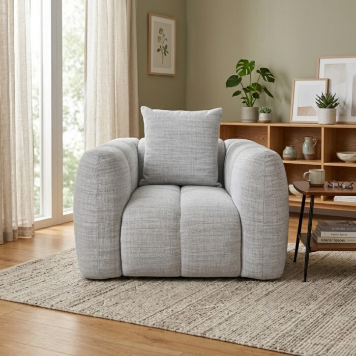 Aria Fabric Armchair in modern living room setting