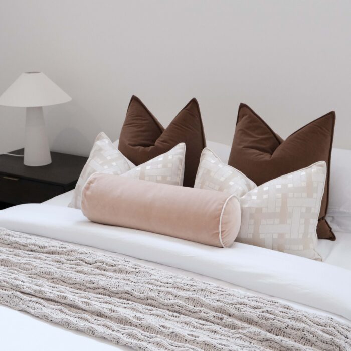 Maison Velvet Bolster Cushion in Soft Sand Tone